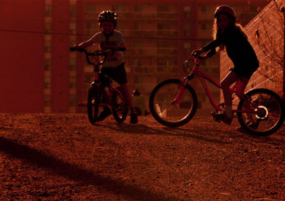 Bicycle parked on street at night