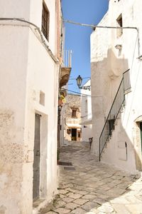 Alley amidst buildings in town