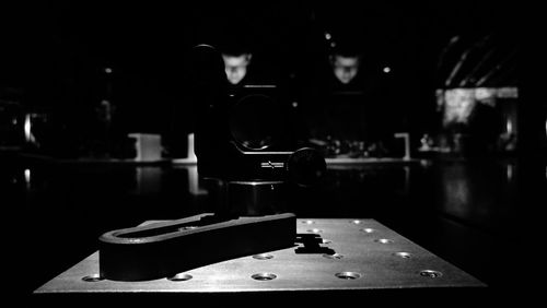 Close-up of piano on table