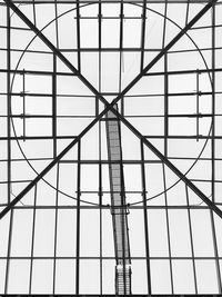 Low angle view of metal structure against sky