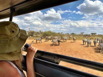 Side view of woman doing safari