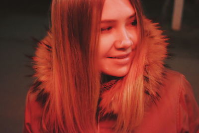 Portrait of smiling young woman