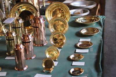 Copper and brass utensils for sale at market stall