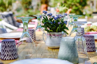 Flower pot on table at restaurant