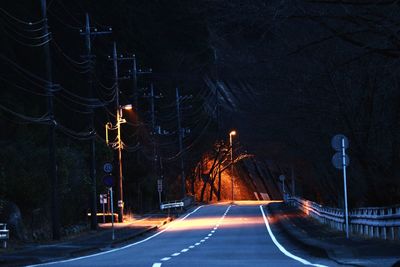 Light trails on road at night