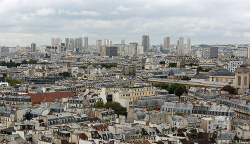 High angle view of buildings against sky in city