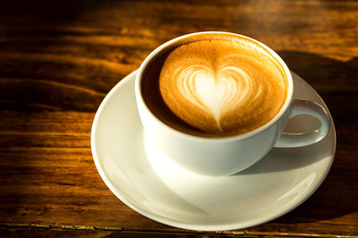 Close-up of cappuccino on table