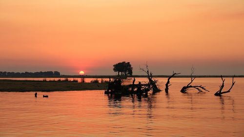 Scenic view of sunset over sea