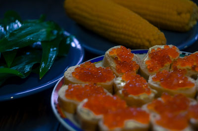 Close-up of strawberries in plate on table