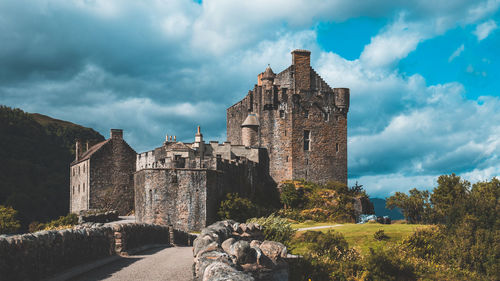 Low angle view of old ruins against sky