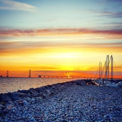 Scenic view of sea at sunset