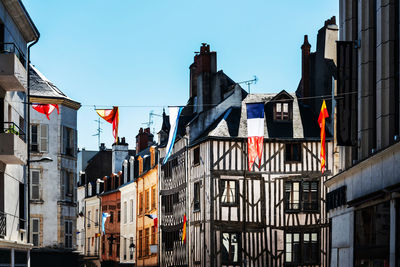 Low angle view of buildings against clear sky