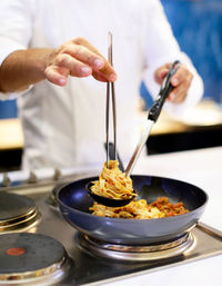 Close-up of person preparing food