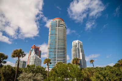 Low angle view of modern buildings against sky