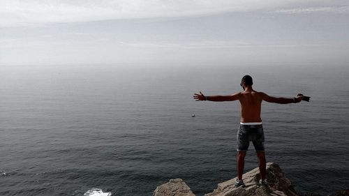 Woman standing on beach