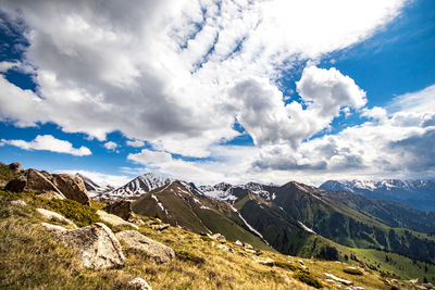 Nature of central asia, scenic tien shan mountains with clouds in the sky