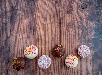 Directly above shot of multi colored candies on table