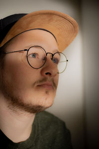 Portrait of young man wearing hat