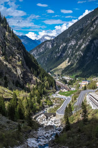 High angle view of road amidst mountains against sky