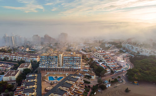 High angle view of street amidst buildings in city