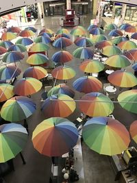 High angle view of multi colored umbrellas in city