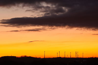 Scenic view of silhouette landscape against sky during sunset