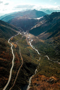 Aerial view of mountain road against sky