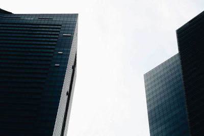 Low angle view of modern buildings against clear sky