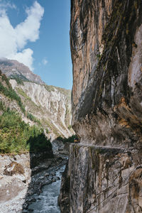 Scenic view of waterfall against sky