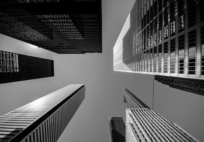 Low angle view of tall buildings against sky