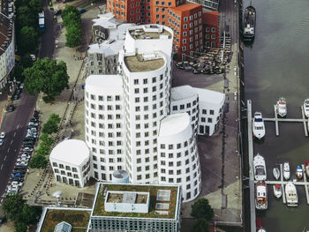 High angle view of buildings and street in city