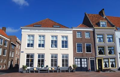 Facade of building against blue sky