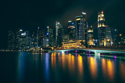 Illuminated cityscape at night