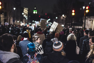 Crowd in city at night