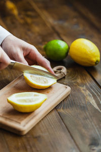 Man preparing food on cutting board