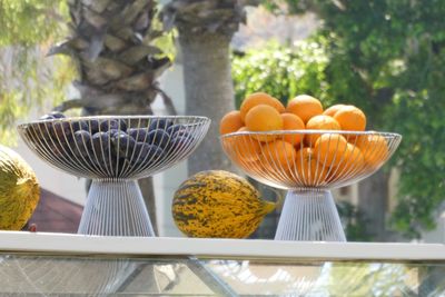 Close-up of fruits in basket on table