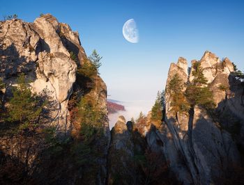 Panoramic view of rock formations against sky