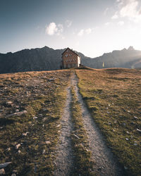 House on field against sky