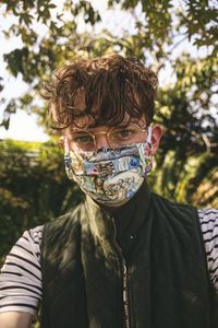 Safety in style. boy wearing colorful face mask. 