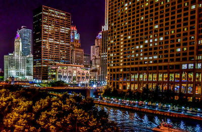 Illuminated cityscape at night