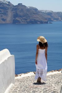 Rear view of woman looking at sea