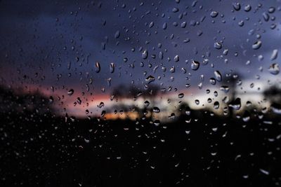 Close-up of water drops on spider web