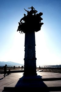 Low angle view of monument against blue sky