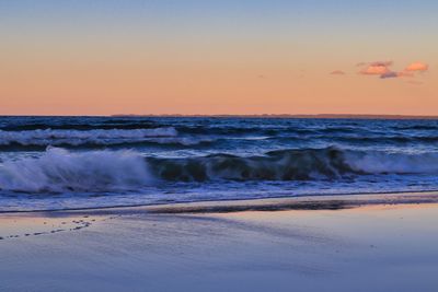 Scenic view of sea against sky during sunset