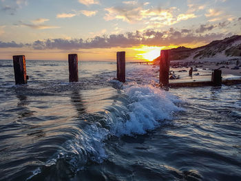 Scenic view of sea against sky during sunset