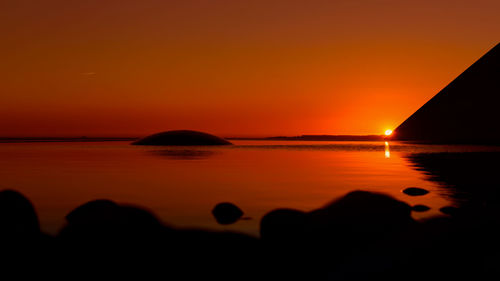 Scenic view of sea at sunset
