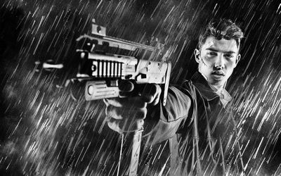 Criminal shooting gun while standing in rain