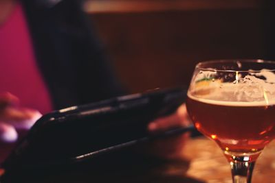 Close-up of beer in glass on table