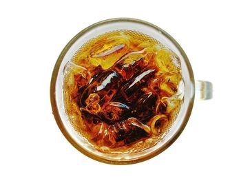 High angle view of drink against white background