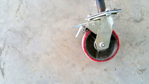 High angle view of telephone booth against wall